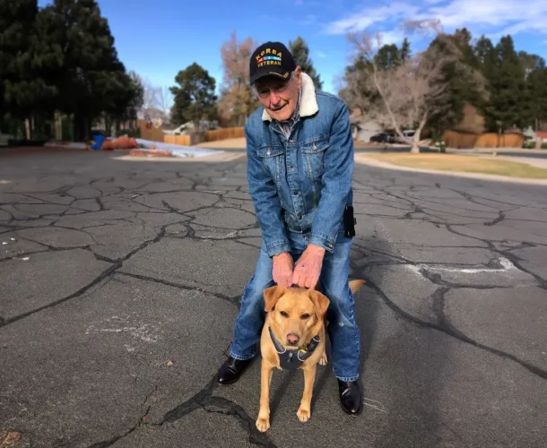 veteran and adopted dog